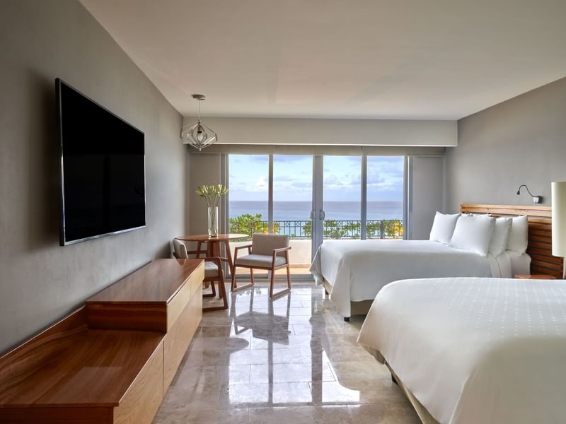 Presidential Suite, twin beds & balcony at FA Hotels & Resorts
