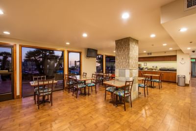 tables and chairs in a dining area