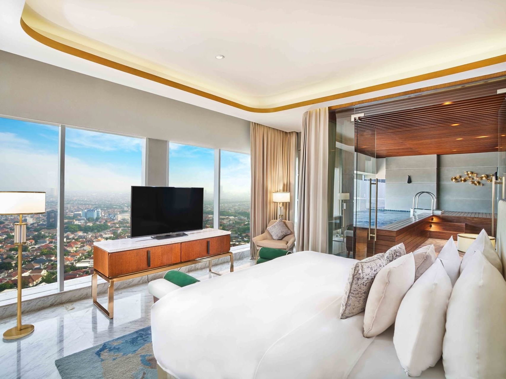 King bed, Tv in Presidential suite at Vasa Hotel Surabaya