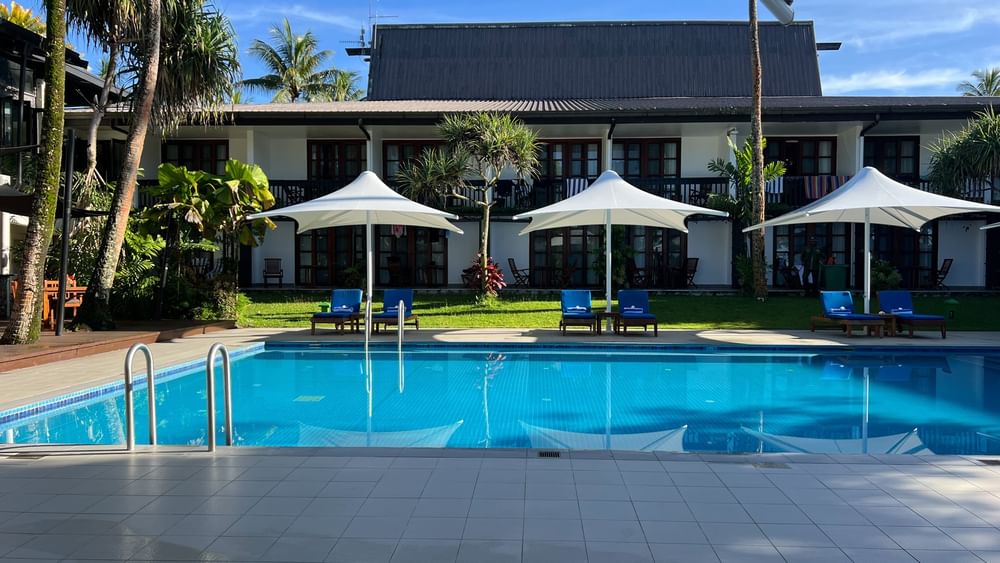 Adult only pool and bar with lounge chairs at Warwick Fiji Resort and Spa in Korolevu.