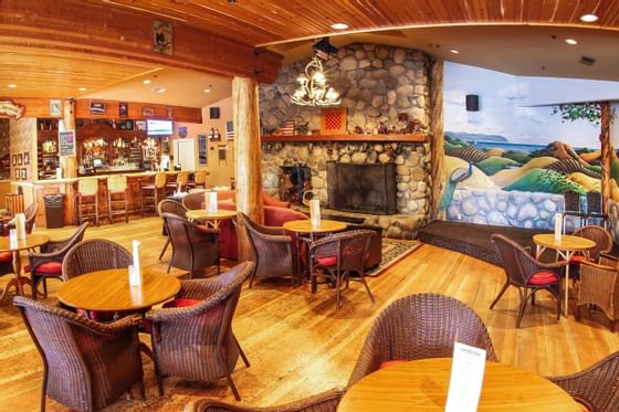 Fireside Lounge dining area with view of performance stage, bar