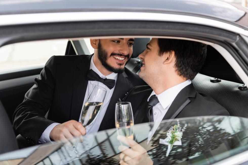 Groom and Groom arriving for their wedding at Villiers Hotel in Buckingham