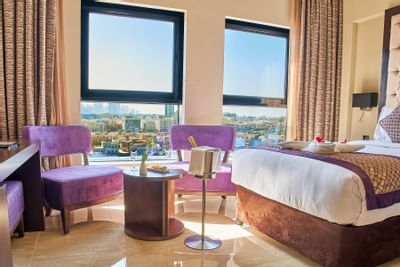 King bed in Studio City View Room at Carlton Dubai Creek Hotel