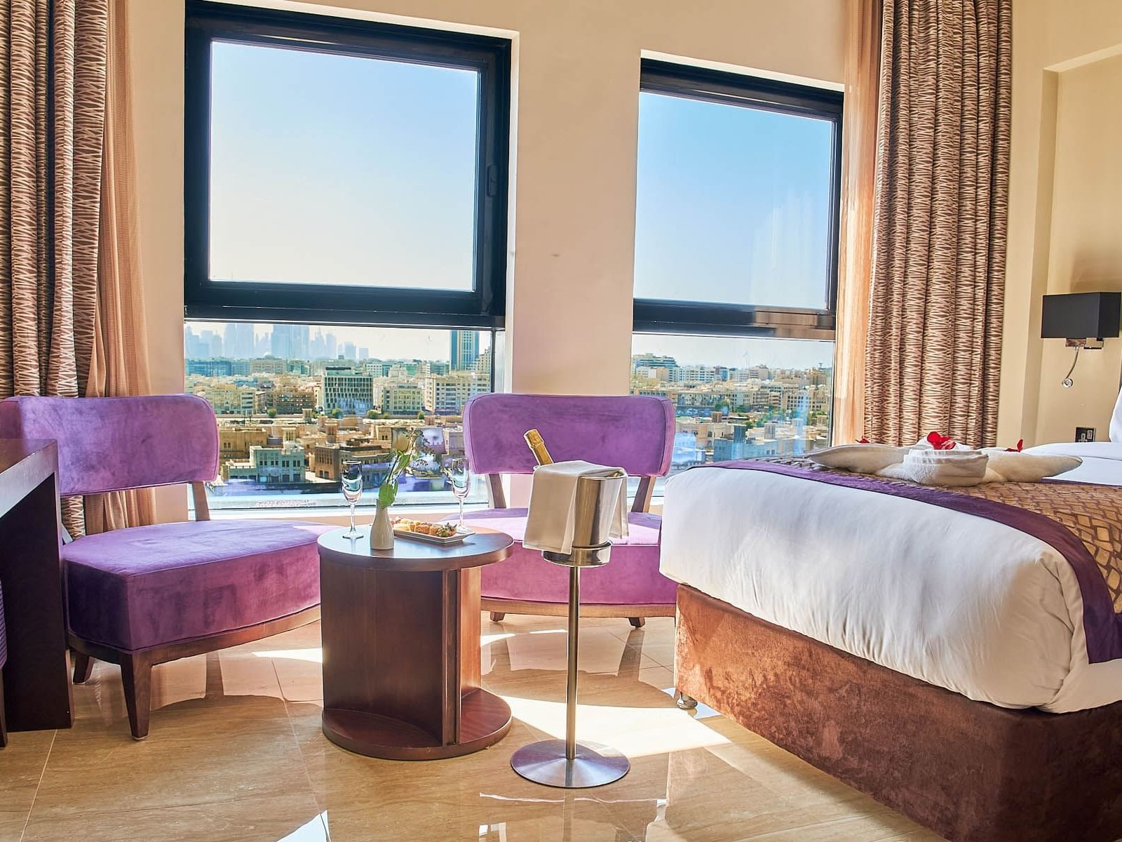 King bed in Studio City View Room at Carlton Dubai Creek Hotel