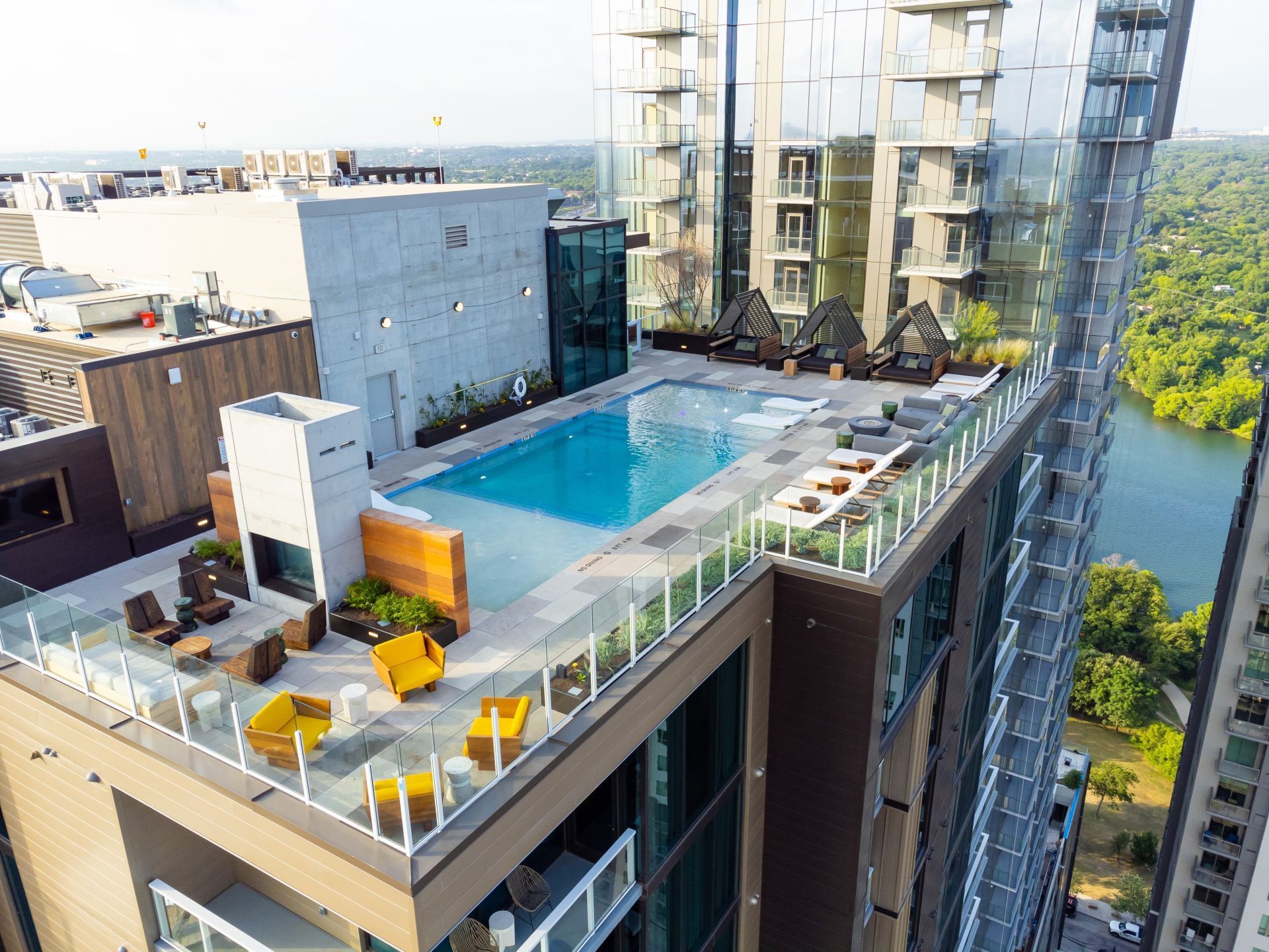 Aerial view of the Austin Condo Hotel with rooftop pool area