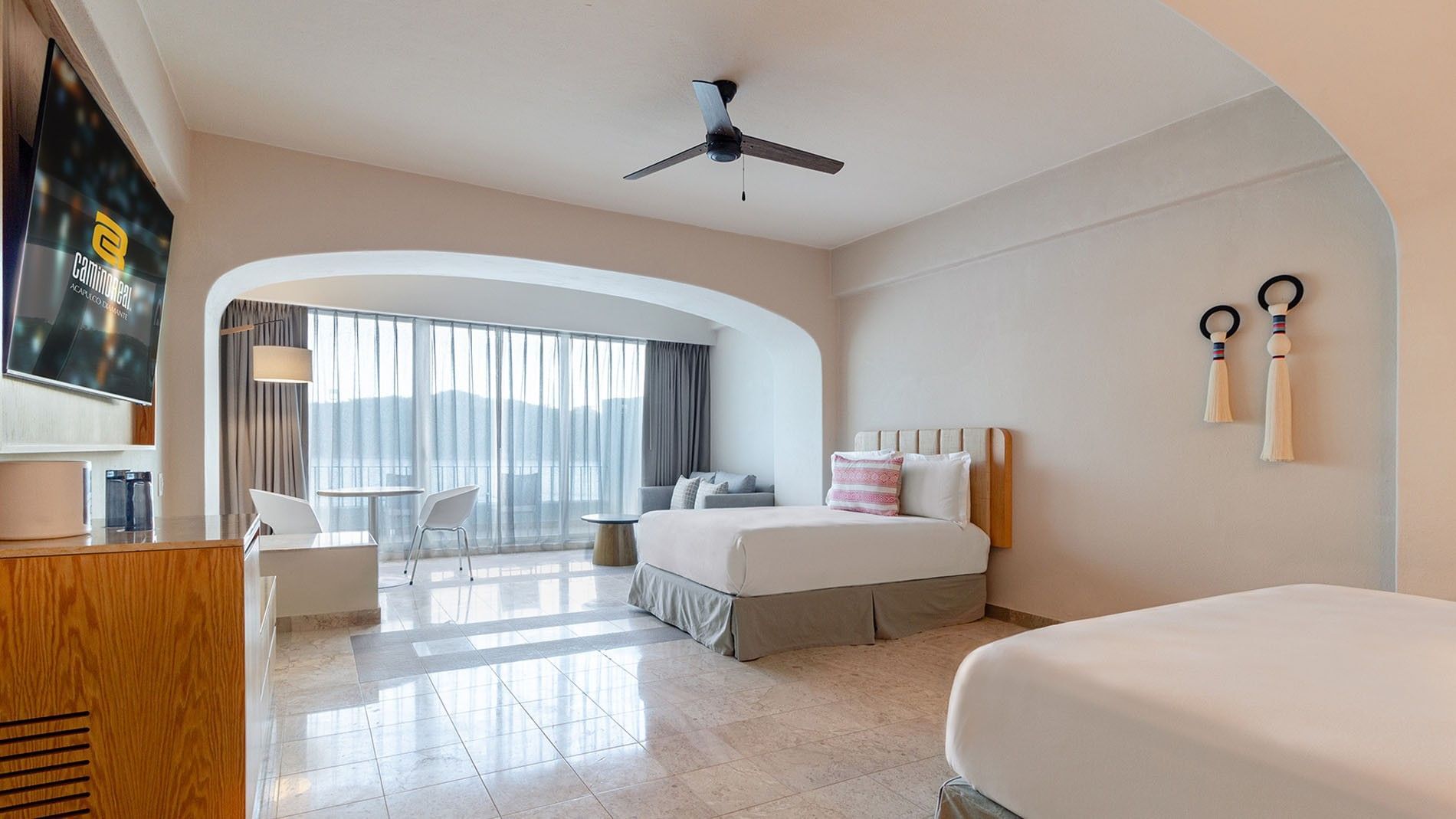 Cozy seating area by the beds in Extra King Bed and Double Bed Deluxe Superior Room at Camino Real Acapulco Diamante