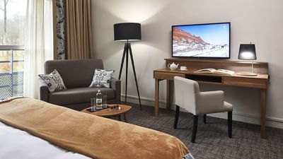 Chambre privilège Deluxe du ForgesHotel, avec vue sur le parc du Domaine, idéale pour un séjour en couple