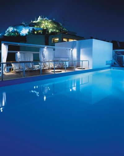 Night view of The outdoor pool at St. George Lycabettus