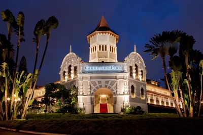 Exterior view of the entrance of Goodwood Park Hotel at night