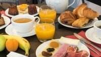 Closeup on breakfast served in  restaurant at Hotel Roca-Fortis