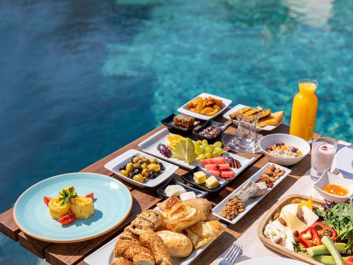 Served dishes on a table in Sitara Restaurant at Senses Hotel