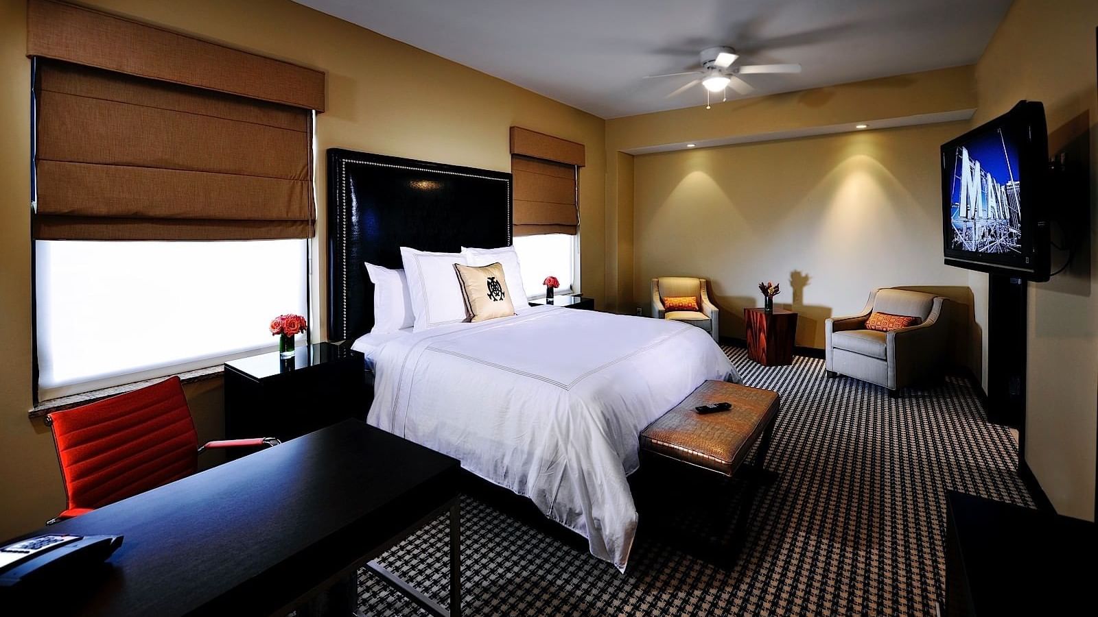 King bed, sofas & working table in Mayo Suite at The Mayo Hotel