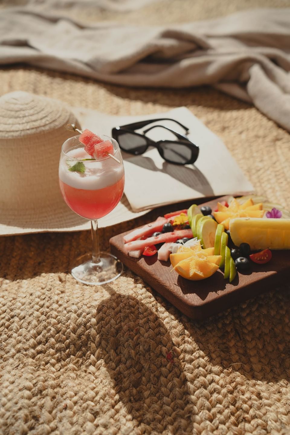 Portrait of a fruit platter & a drink at Bougainvillea Barbados