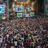 A vibrant summer festival in Istanbul with crowds enjoying music