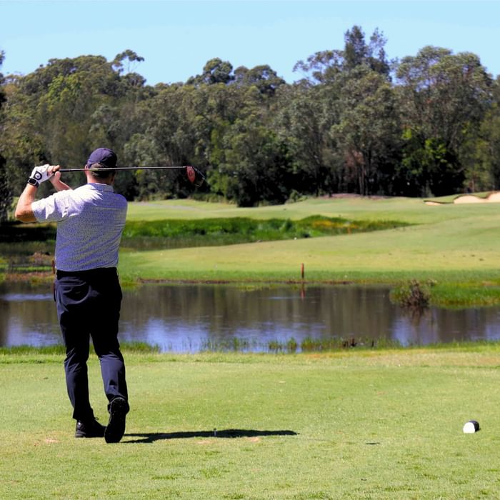man playing golf at kooindah waters golf course on the central coast