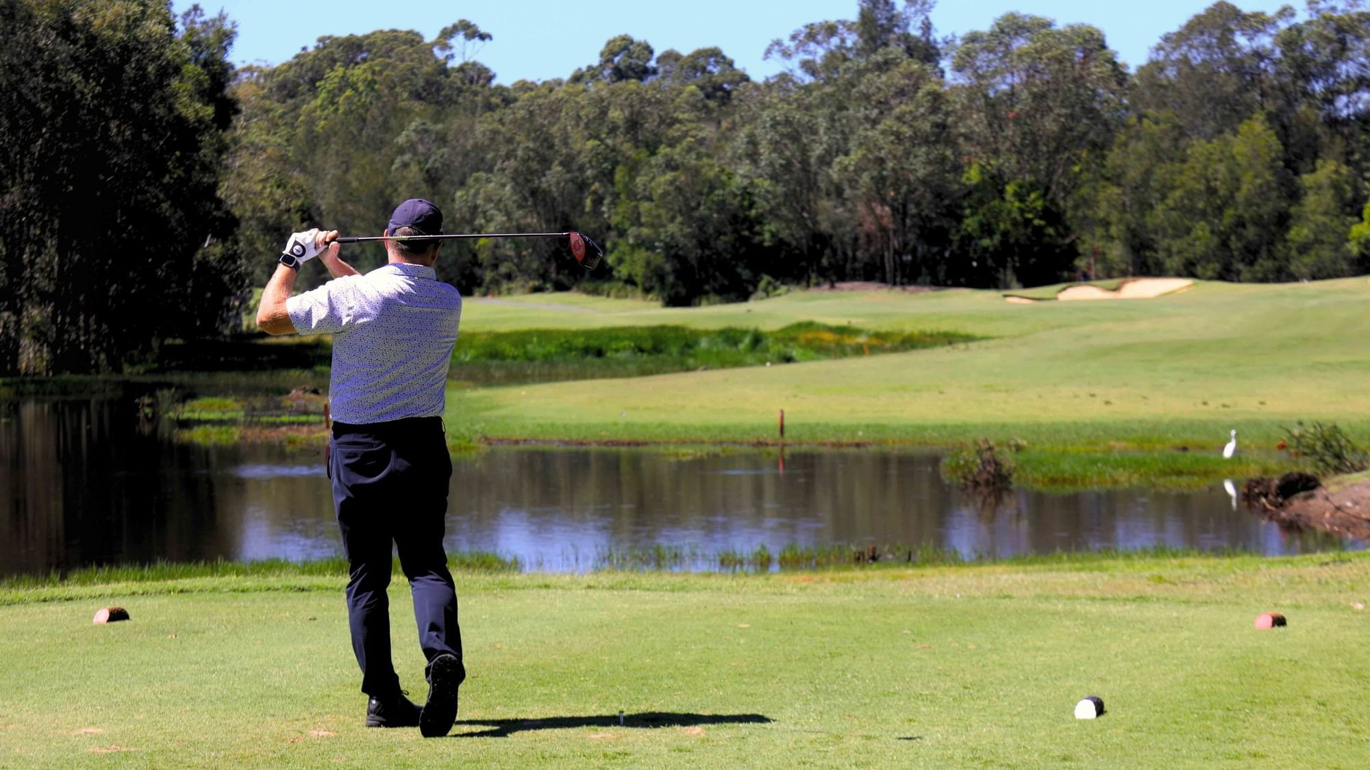 man playing golf at kooindah waters golf course on the central coast