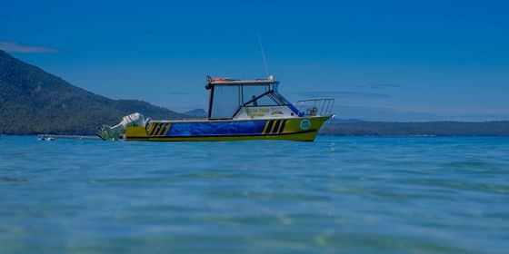 Aqua Taxi sailing around the sea near Freycinet Lodge