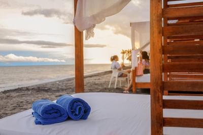 Cabana's in Bianca Beach Club at sunset near Playa Blanca Beach Resort