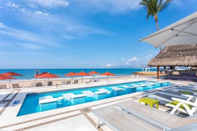 Pool with wet loungers at Buenaventura Grand Hotel