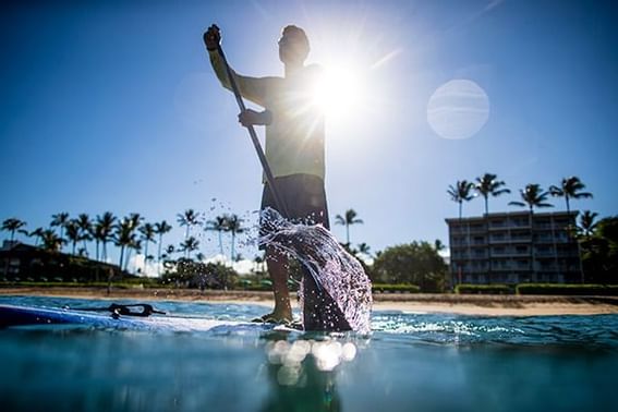 Paddleboarding in the ocean at Ka'anapali Beach Hotel Hawaii