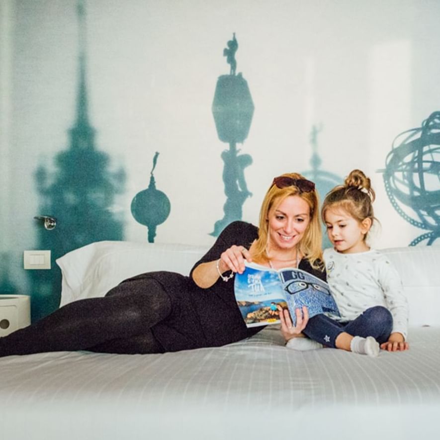Turin with kids: mom and daughter in a hotel suite