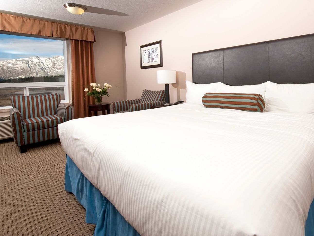 Comfy bed in King Room at Stoney Nakoda Resort & Casino
