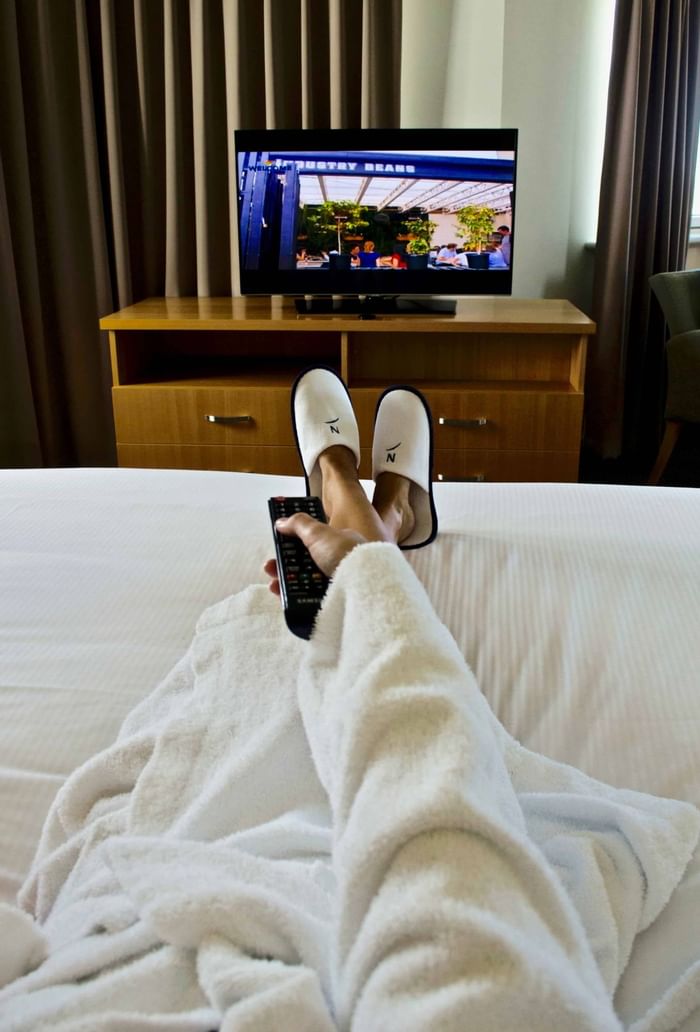 Watching tv in Novotel Perth Langley hotel | Accommodation Perth CBD | Accommodation Perth WA