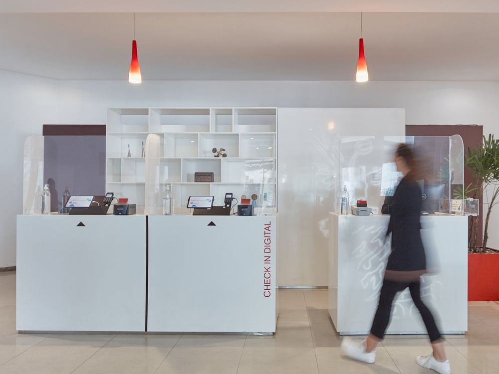 Front view of the reception counter at Fiesta Inn Hotels