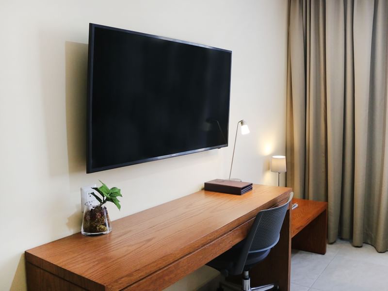 TV station & desk in the Superior King Room at Gamma Hotels