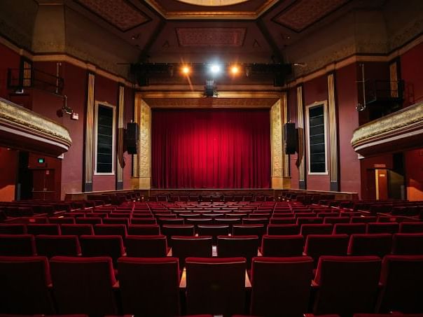 Theatre set-up with red seats & red curtains in Princess Theatre near Hotel Grand Chancellor Launceston