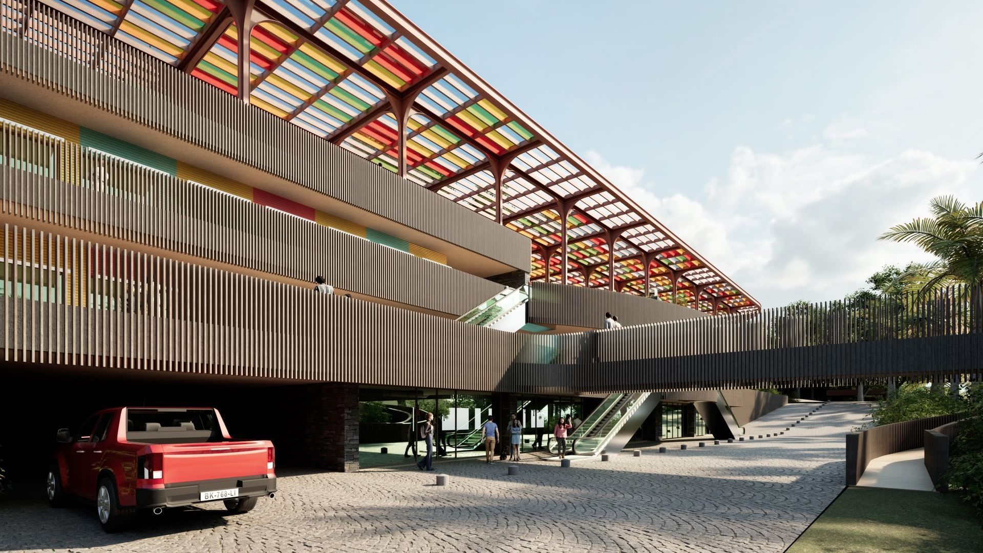 BlueZone Shopping Center with a striking, colorful canopy and a sleek exterior at A'ila Resorts