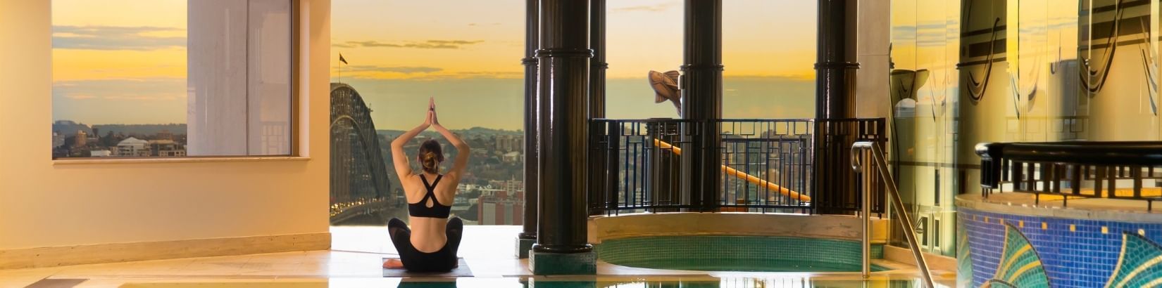 Doing Yoga with a view at The Sebel Quay West Suites Sydney