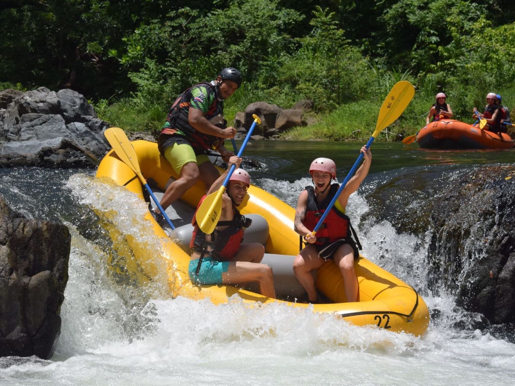 People enjoying rafting on a river near Villas Sol Beach Resort