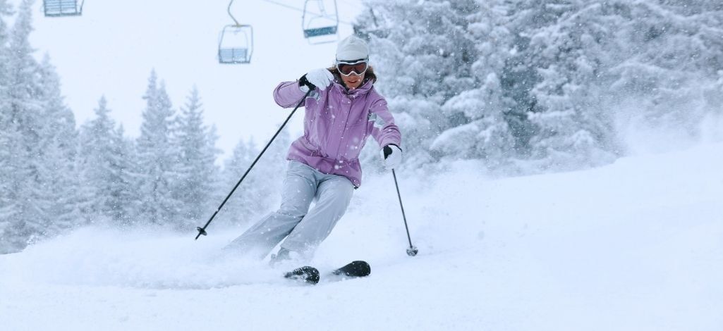Skier on snowy Whistler mountain slope
