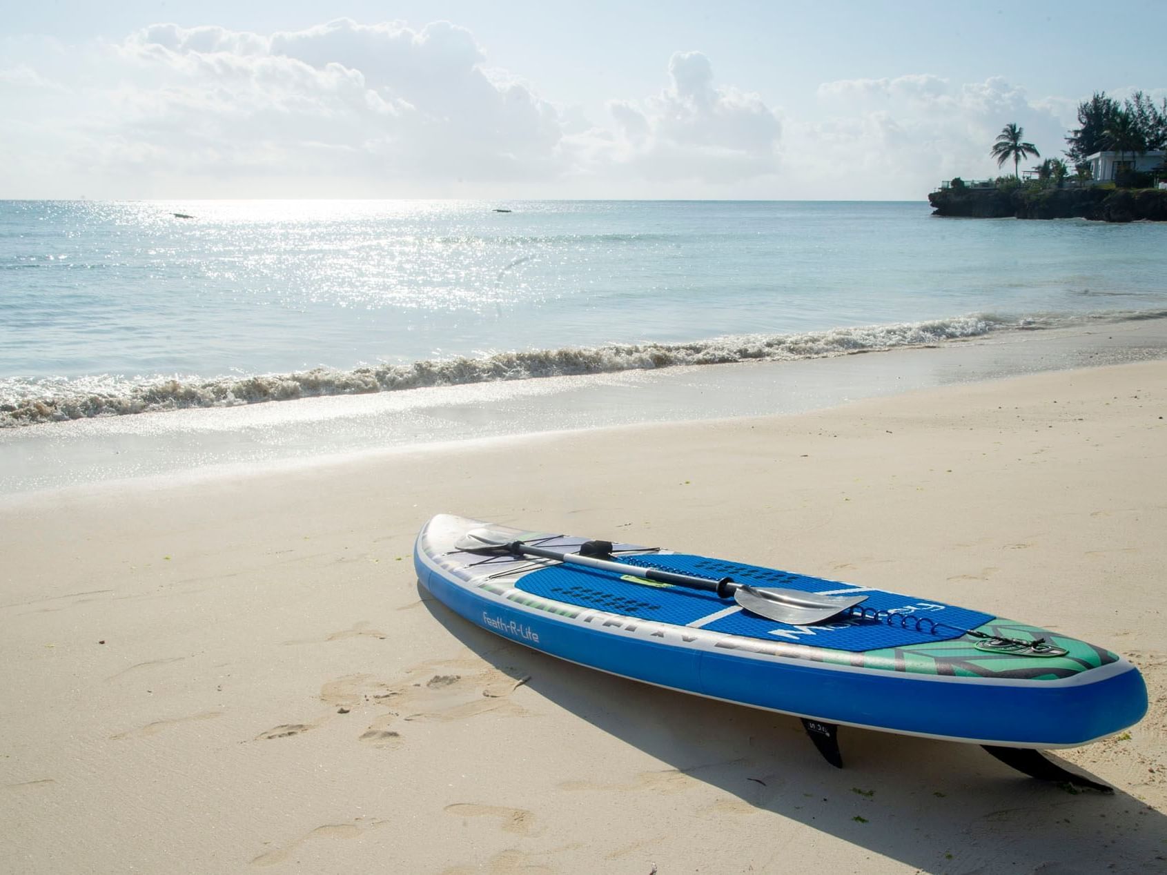 Paddle Board on the beach near SafiraBlu Luxury Resort & Villas