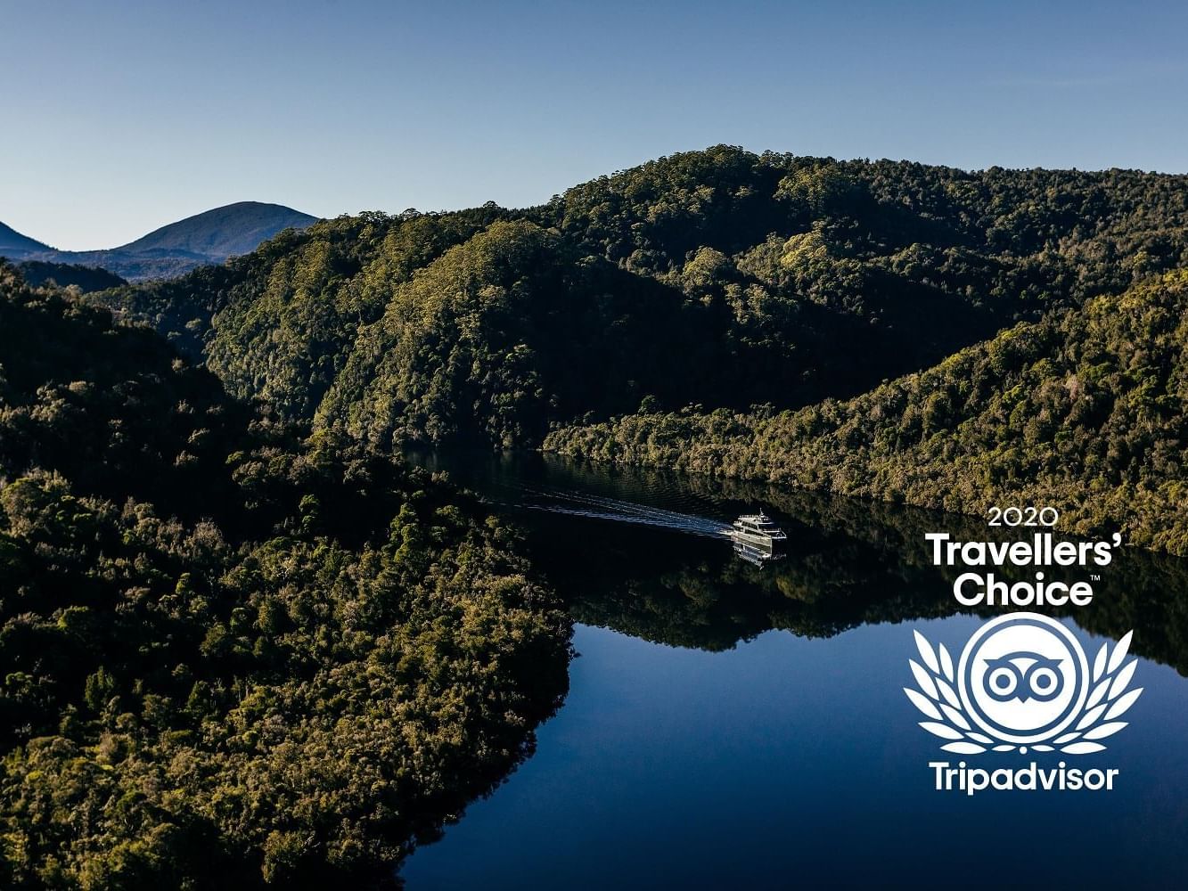 Landscape view of the mountains & river at Gordon River Cruise