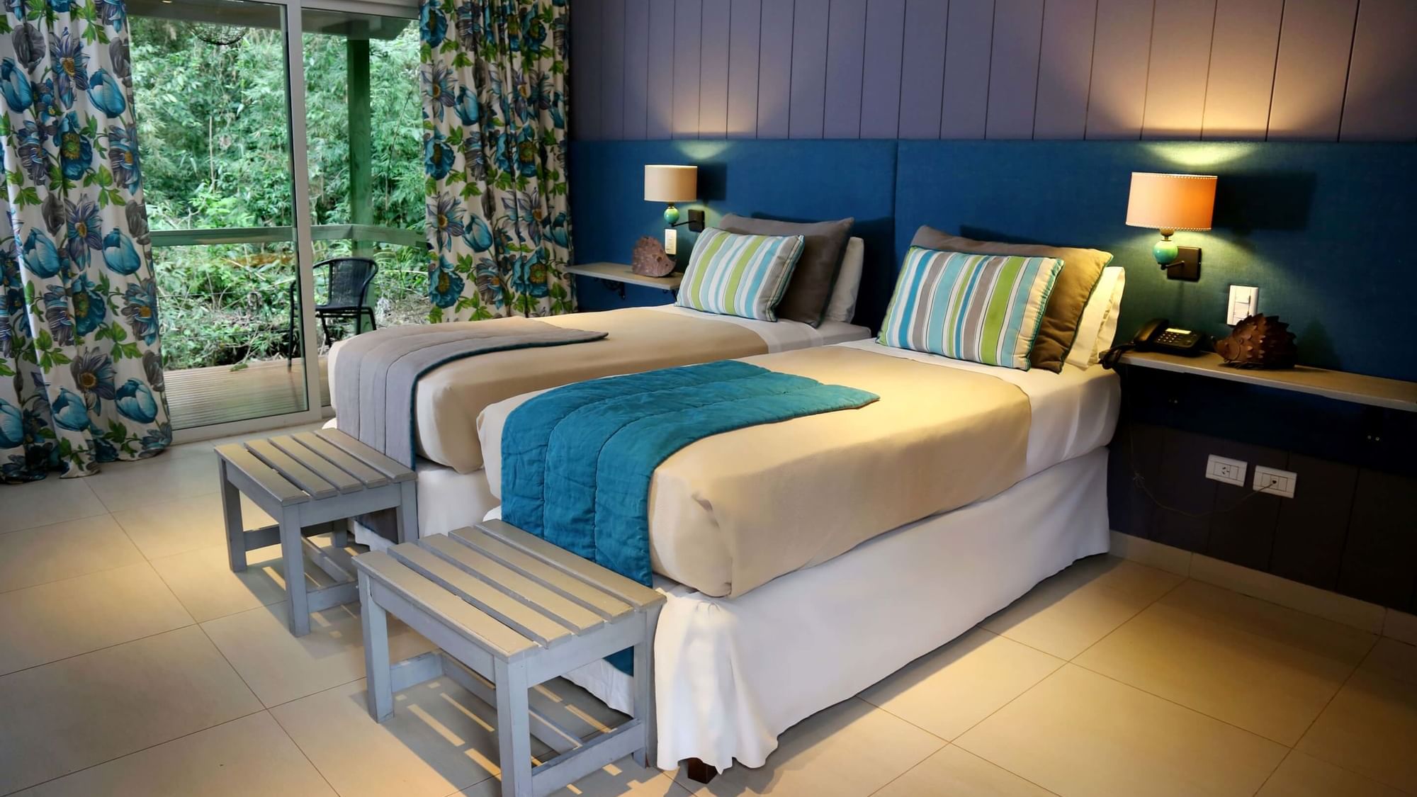 Bedroom arrangement in Forest Room at DOT Hotels