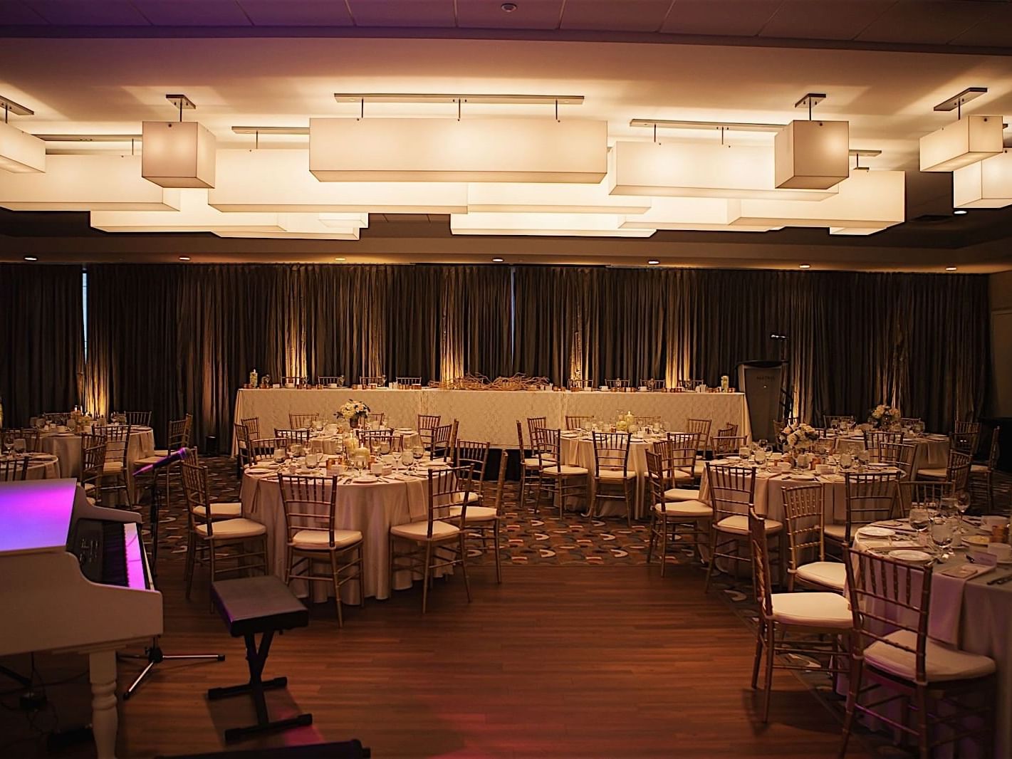 Banquet table setup in Quartz ballroom at Matrix Hotel