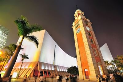 Low angle view of Former Kowloon-Canton Railway Clock Tower near Park Hotel Hong Kong
