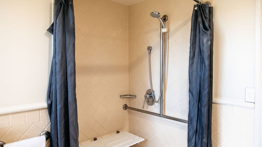 Spacious Accessible Bathroom with Adjustable Hand Held Shower Head