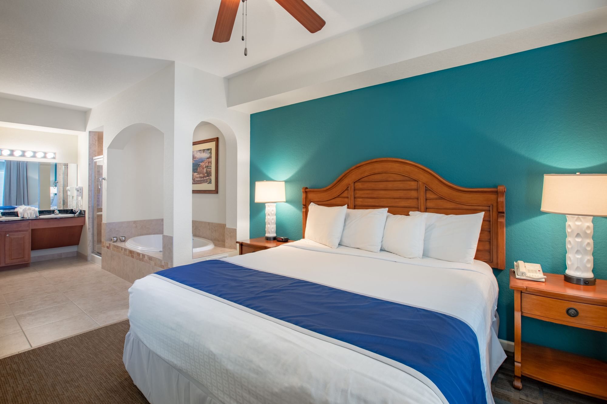 Bathtub by the bed in Master Bedroom at Lake Buena Vista Resort Village & Spa