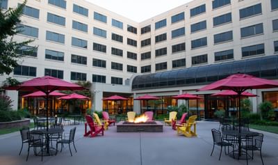 North courtyard with chairs at NCED Hotel and Conference Center