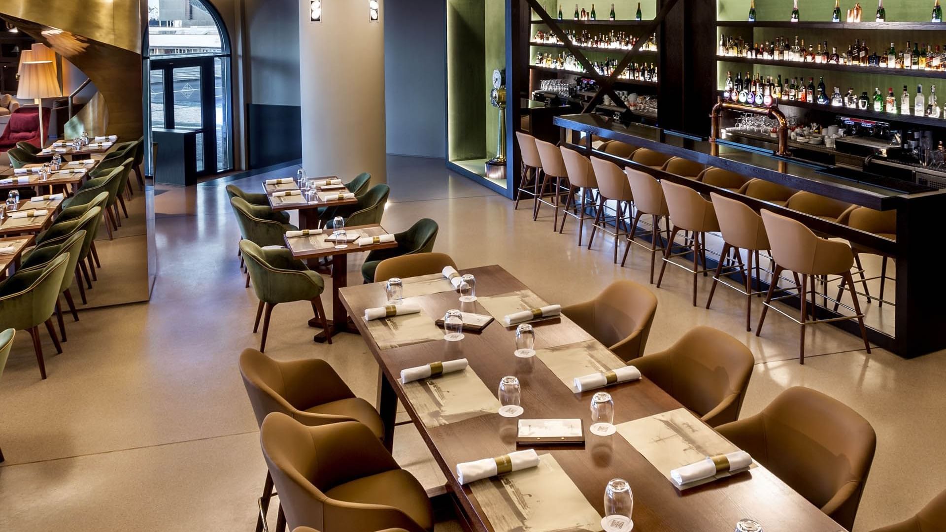 Communal tables in Vapore Restaurant at Bensaude Hotels