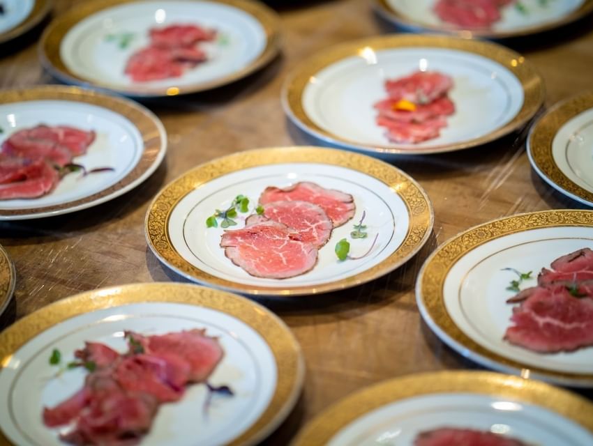 Meat dishes arranged on a table at Hotel El Convento