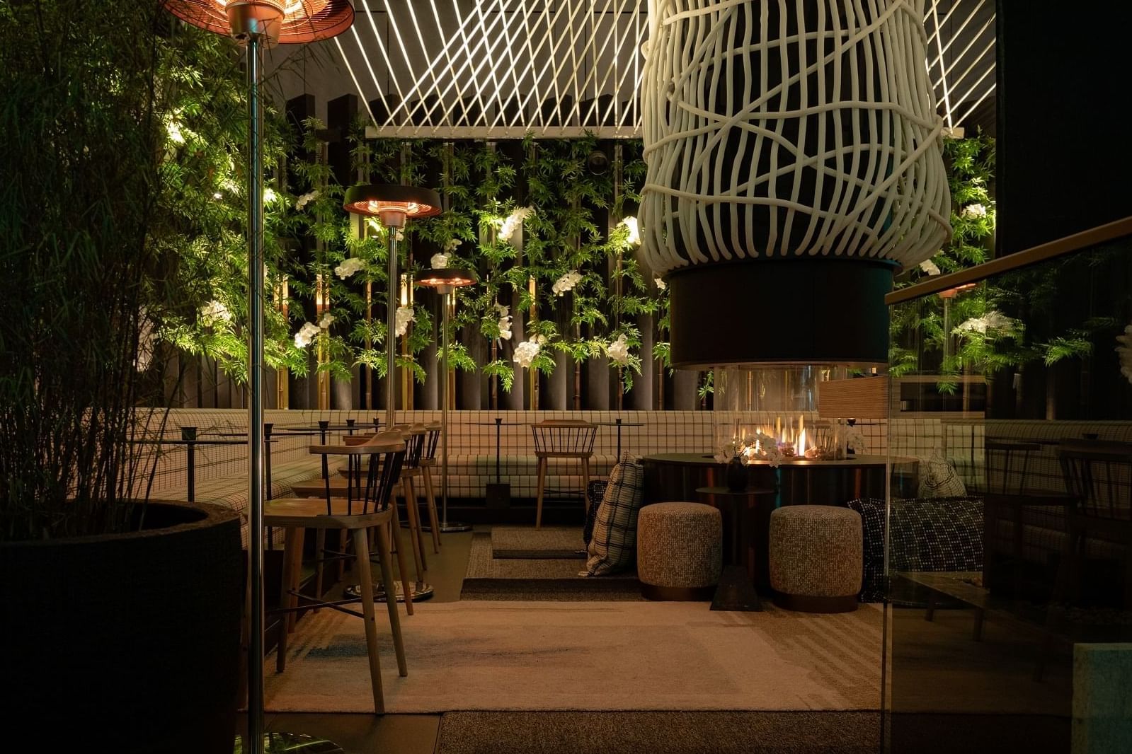 Interior of Rooftop bar with loungers at The Londoner