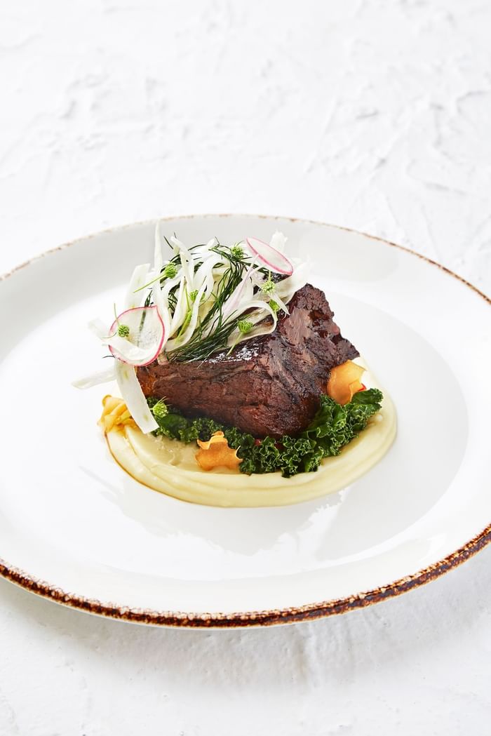 Close up of Wagyu Short Rib dish served at The Fullerton Hotel Sydney
