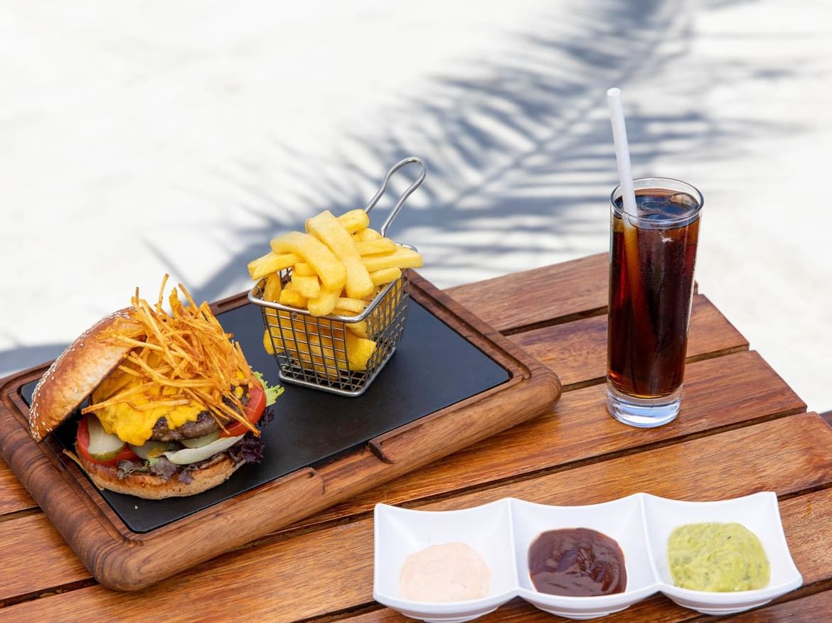 Burger & chips on a plate in Sitara Restaurant at Senses Hotel