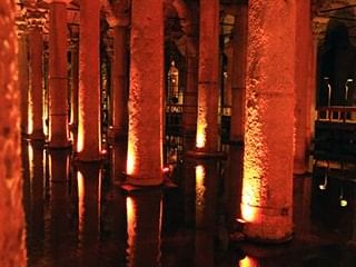 Exterior view of Basilica Cistern at night near CVK Hotels
