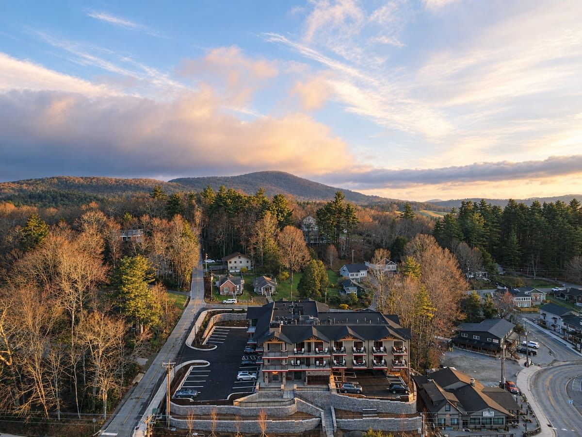 Exterior aerial view of The Embers Hotel in fall