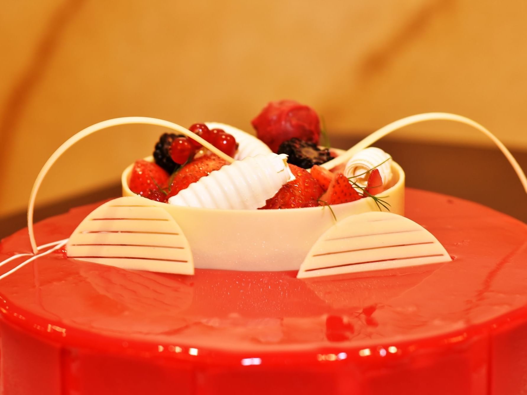 Close-up on a strawberry mousse cake at City Seasons Hotels
